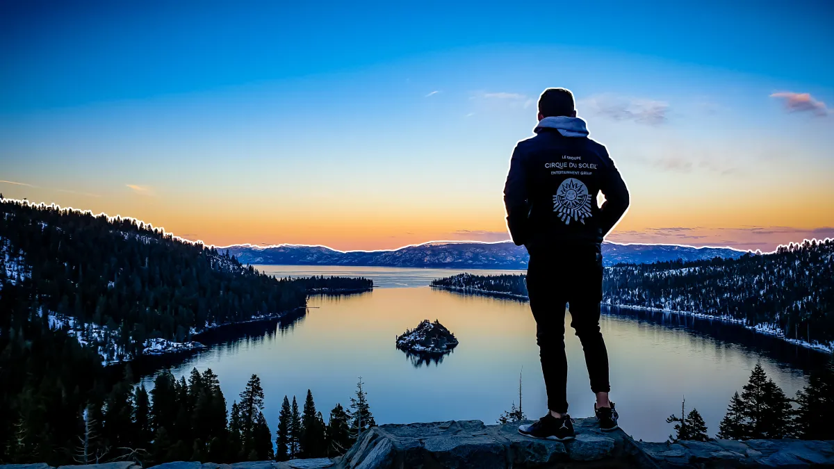 Laido Dittmar in his Cirque du Soleil jacket, overlooking Emerald Bay at Lake Tahoe at sunset